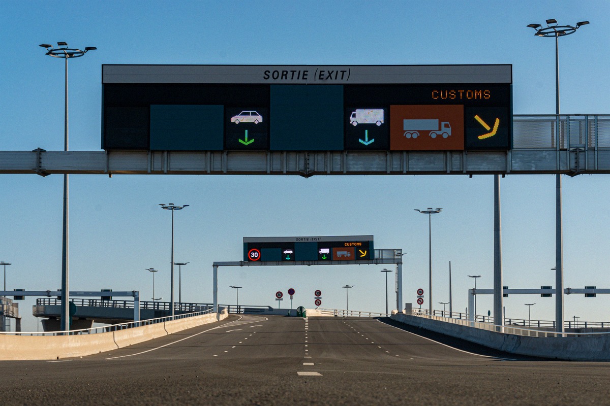 Vehicles leaving the ferry port of Calais past the customs control
